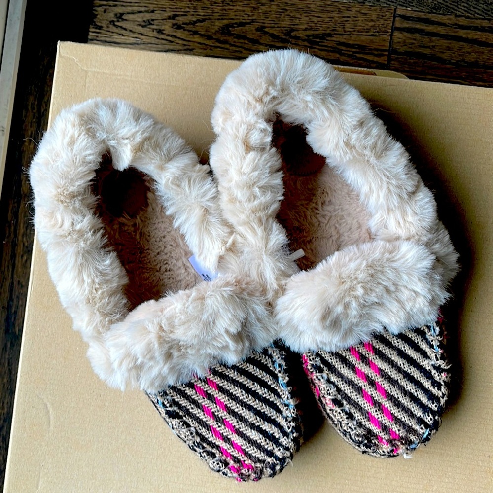 Far Away From Close. Woman’s slippers